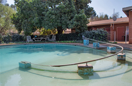The PRH disabled care facilities include a wheel-chair enabled swimming pool set in beautiful, well-maintained gardens.